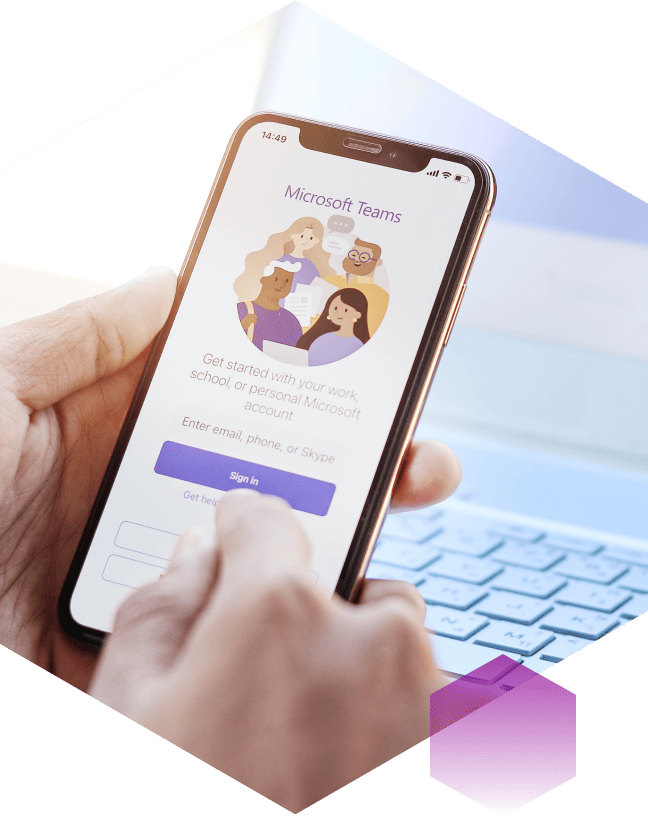 Microsoft Partnership. Hand holding a phone with Microsoft teams